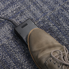 Load image into Gallery viewer, A close-up of a person's brown suede boot pressing a black electronic foot pedal for a Wire200 binding machine