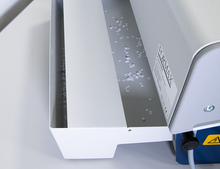 Load image into Gallery viewer, Close-up of a waste tray on binding machine