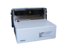 Load image into Gallery viewer, A FORMAX industrial machine with a light gray front panel and dark gray upper housing, shown on a plain white background.