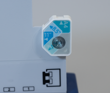 Load image into Gallery viewer, A close-up of a page size adjustment knob on a  punch &amp; binding machine