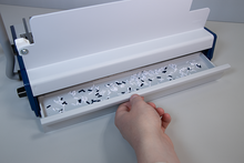 Load image into Gallery viewer, ReadyCombM-punch-waste-tray-open-with-hand-