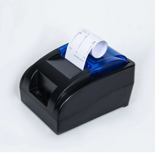 Load image into Gallery viewer, Black and blue thermal printer with a roll of paper on a white background